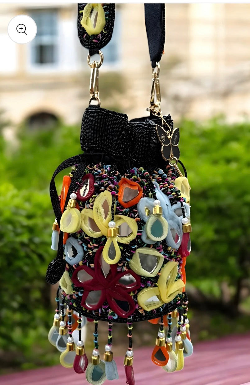 Mirror embroidered Jhallar partywear potli bag