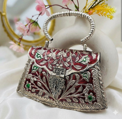Imperial Heritage: Hand-Carved Meenakari Metal Clutch